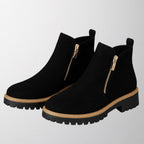 Women's shoe with round toe and side zip fastening