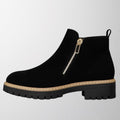 Women's shoe with round toe and side zip fastening