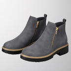Women's shoe with round toe and side zip fastening