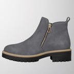 Women's shoe with round toe and side zip fastening
