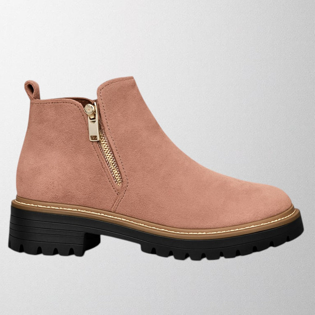 Women's shoe with round toe and side zip fastening