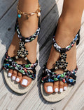 Women's Braided Flat Sandals with Floral Charm Details
