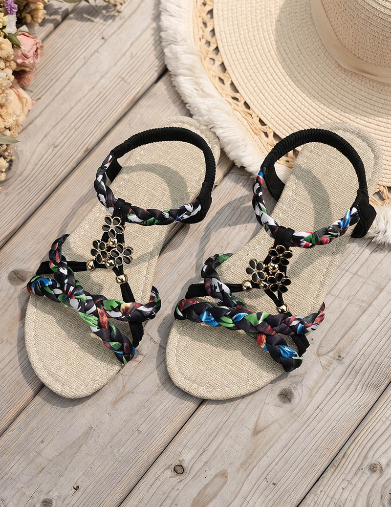 Women's Braided Flat Sandals with Floral Charm Details