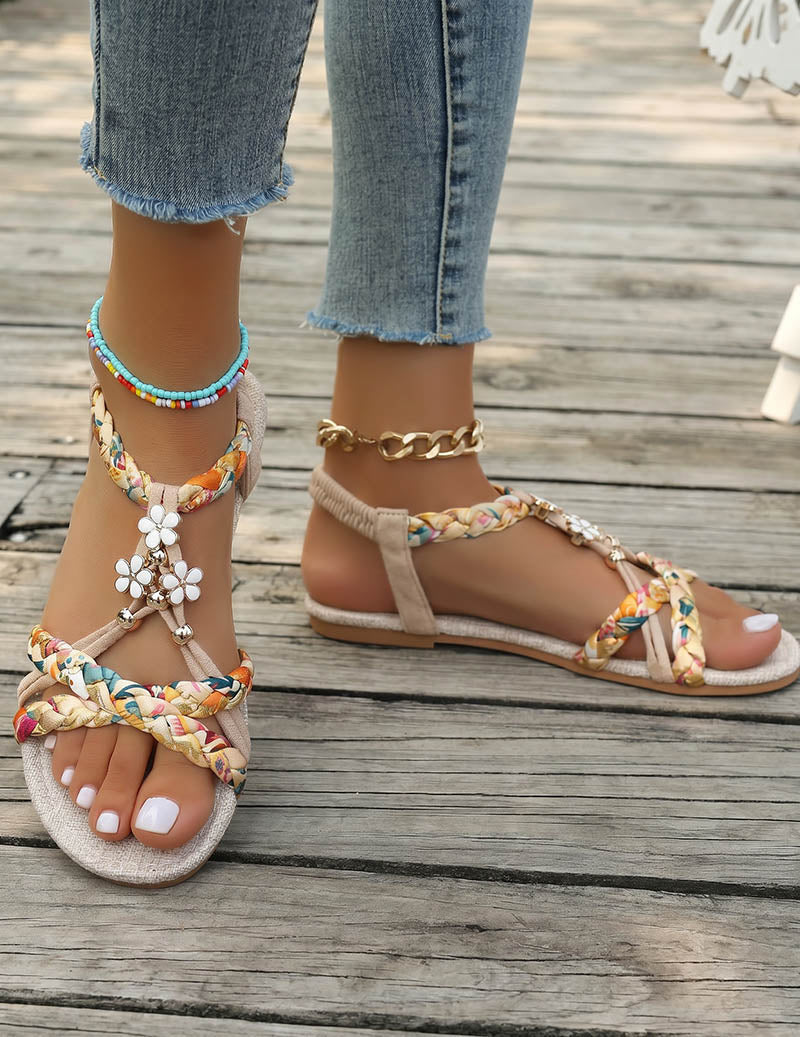 Women's Braided Flat Sandals with Floral Charm Details