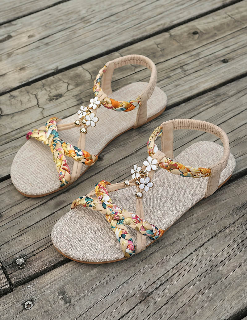 Women's Braided Flat Sandals with Floral Charm Details