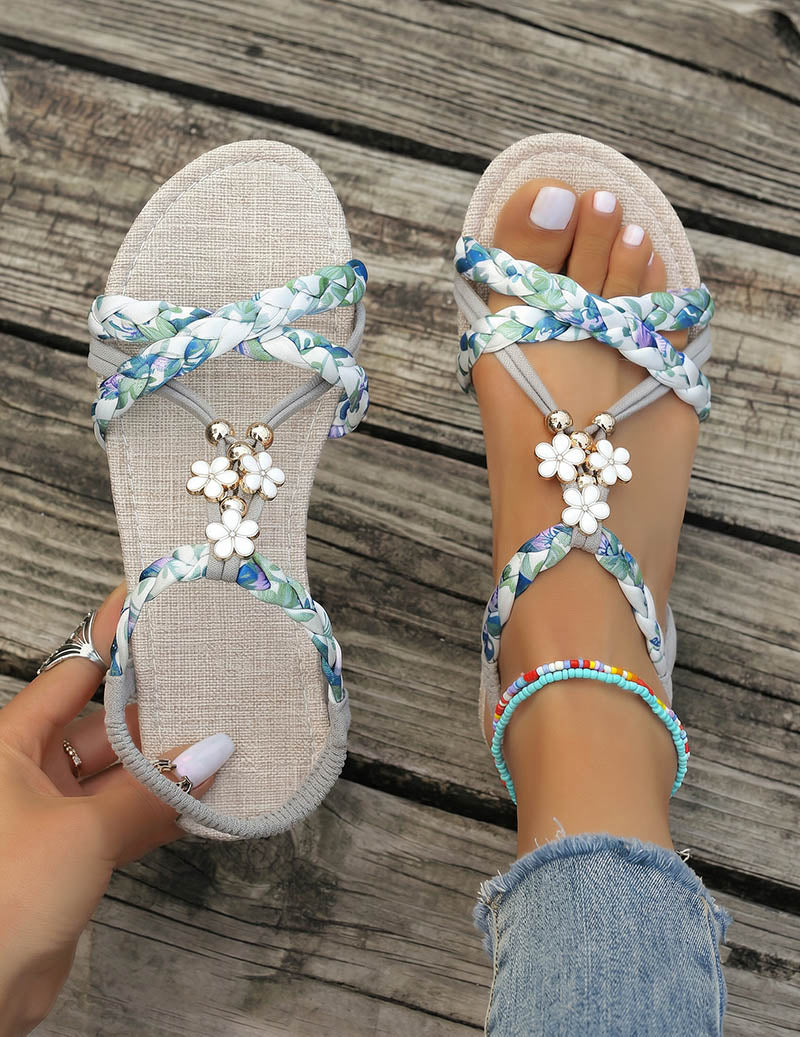 Women's Braided Flat Sandals with Floral Charm Details