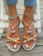 Women's Braided Flat Sandals with Floral Charm Details