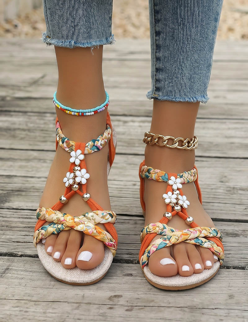 Women's Braided Flat Sandals with Floral Charm Details